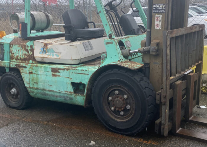 green industrial forklift