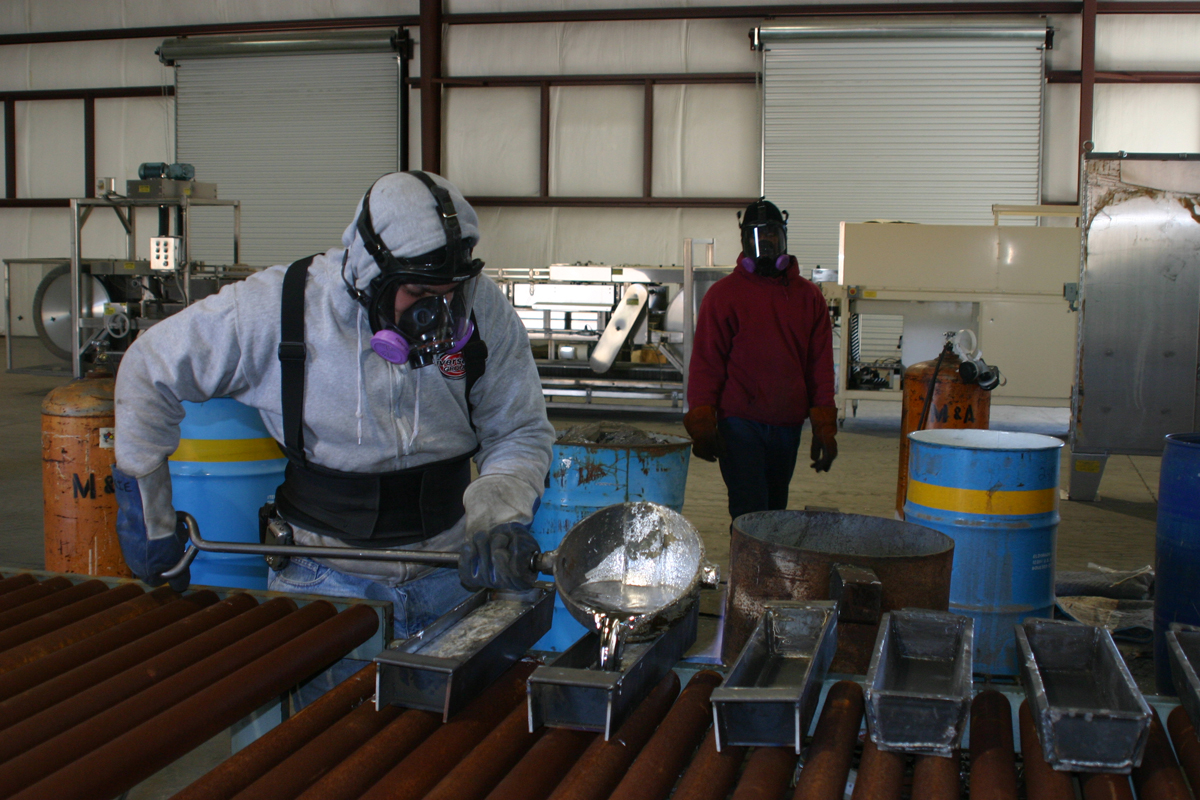 pouring melted lead from our munitions destruction furnace